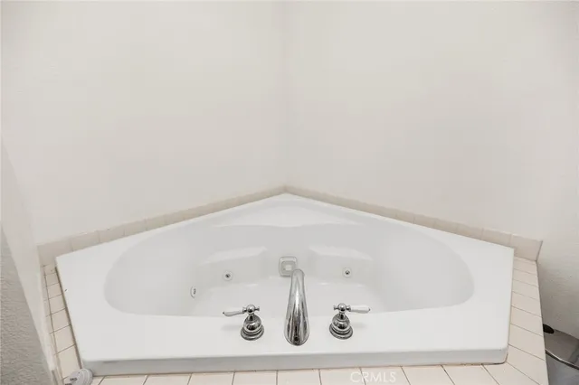 a bath tub sitting in a bathroom