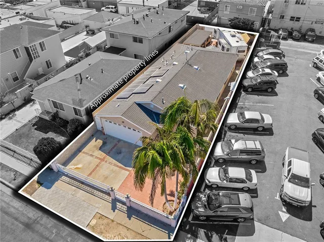 an aerial view of multiple houses with yard