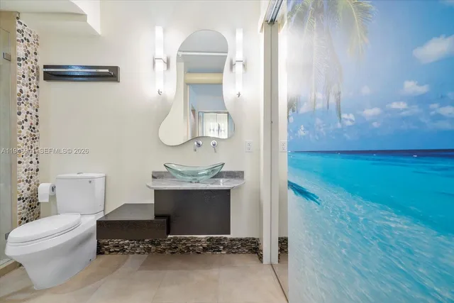 a bathroom with a tub and shower