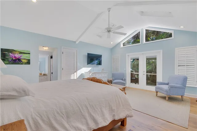 a bed room with a bed and furniture