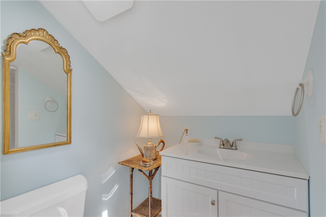 1971 Pebble Path Vero Beach, FL 32963 - Photo 29 of 36 a bathroom with a sink and mirror with toilet