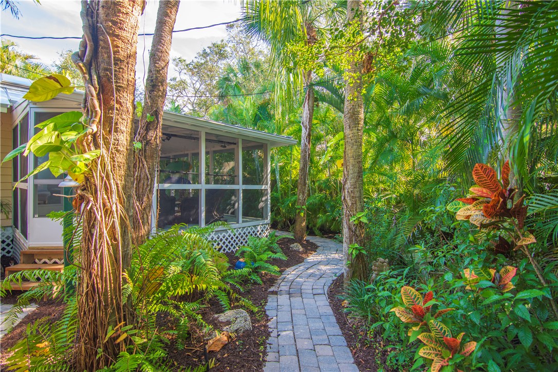 1971 Pebble Path Vero Beach, FL 32963 - Photo 30 of 36 a view of a back yard with flower plants