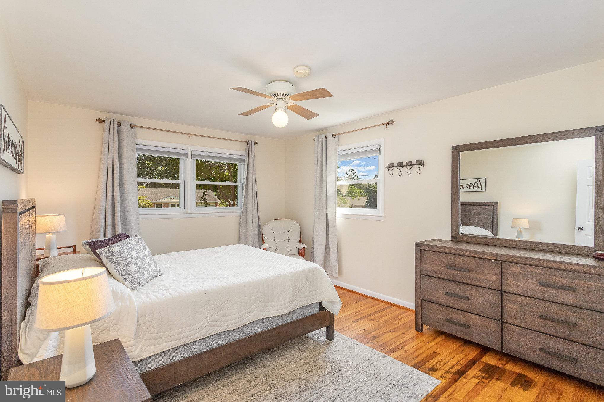 1556 Lambeth Road Lancaster, PA 17601 - Photo 15 of 42 a bedroom with a bed and wooden floor