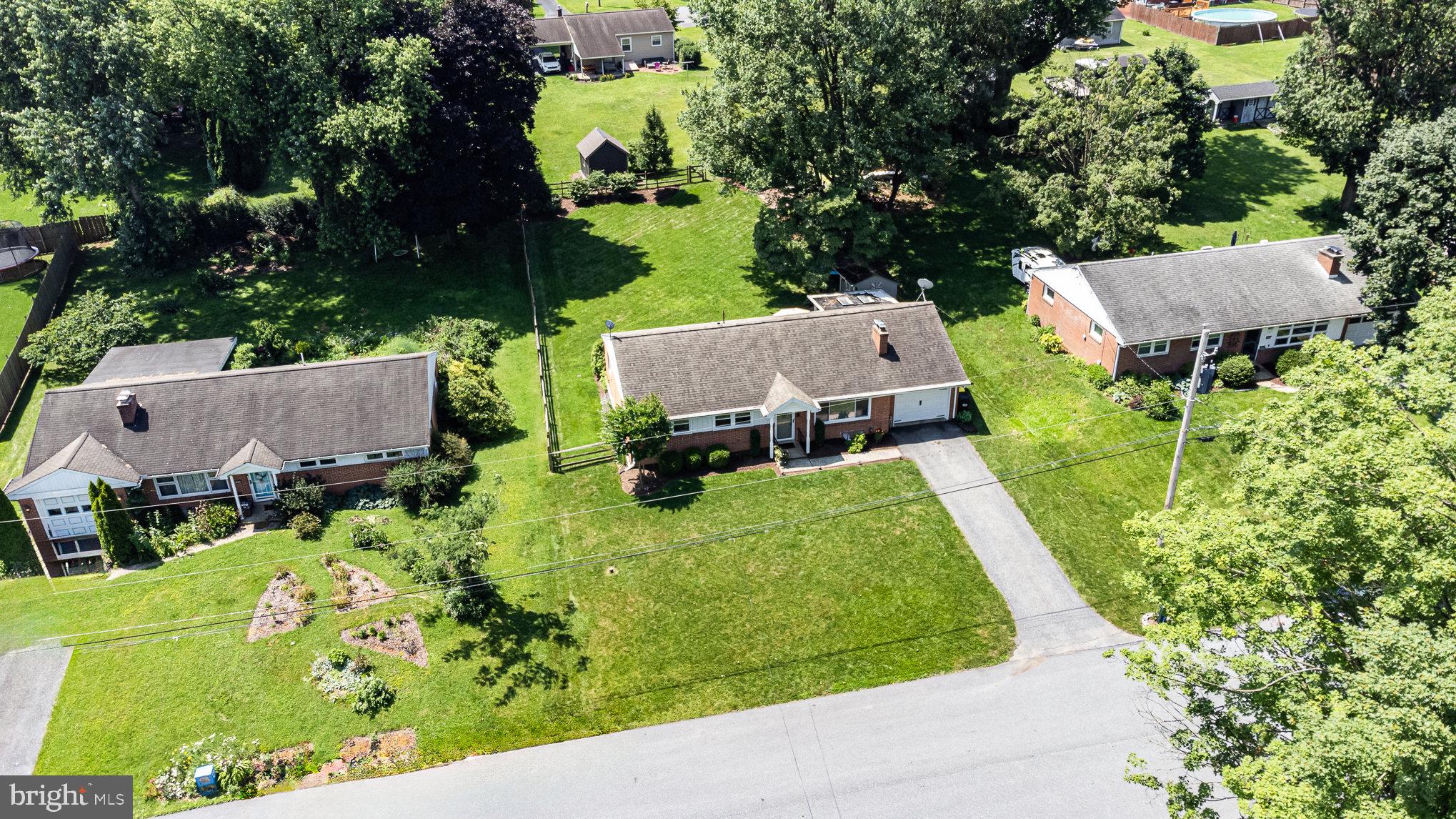 1556 Lambeth Road Lancaster, PA 17601 - Photo 34 of 42 an aerial view of a house with a garden and plants