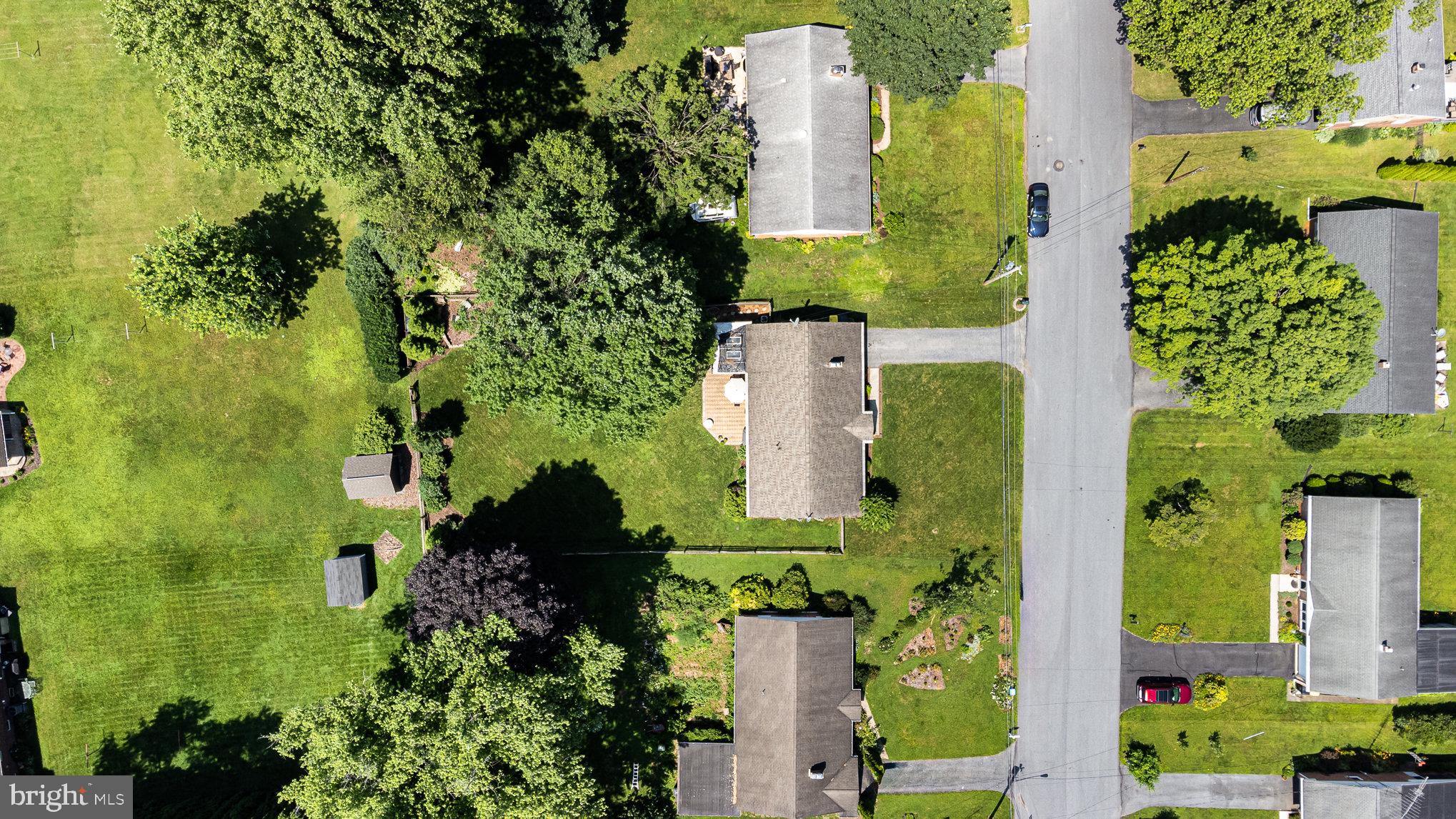 1556 Lambeth Road Lancaster, PA 17601 - Photo 36 of 42 an aerial view of a residential apartment building with a yard