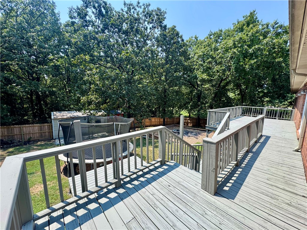 1197 Ridgeview Lane Russellville, AR 72802 - Photo 36 of 44 Expansive multi-level wood deck featuring a railing system and stairs leading to the backyard