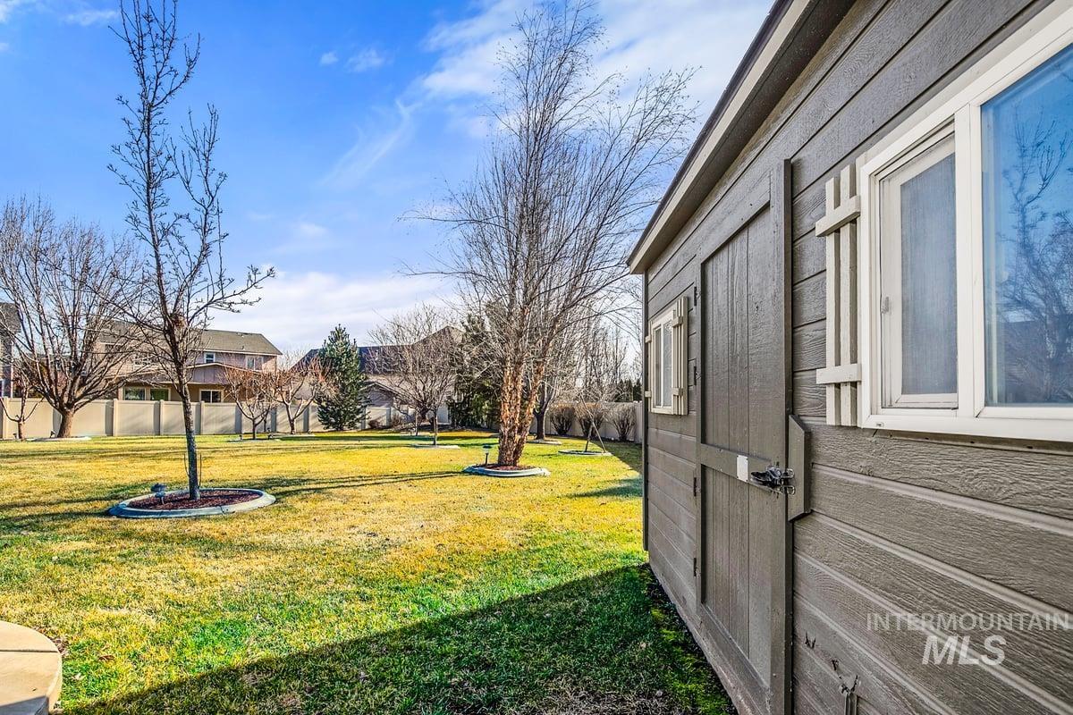 1213 West Lowry Street Meridian, ID 83646 - Photo 37 of 38 View of yard featuring a residential view