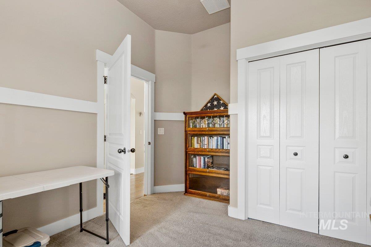 1213 West Lowry Street Meridian, ID 83646 - Photo 6 of 38 Office area with light carpet and baseboards