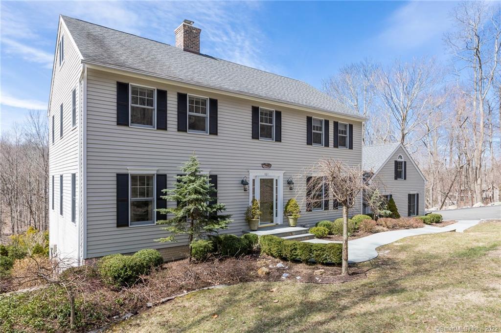161 Oscaleta Road Ridgefield, CT 06877 - Photo 1 of 1 a front view of a house with a yard