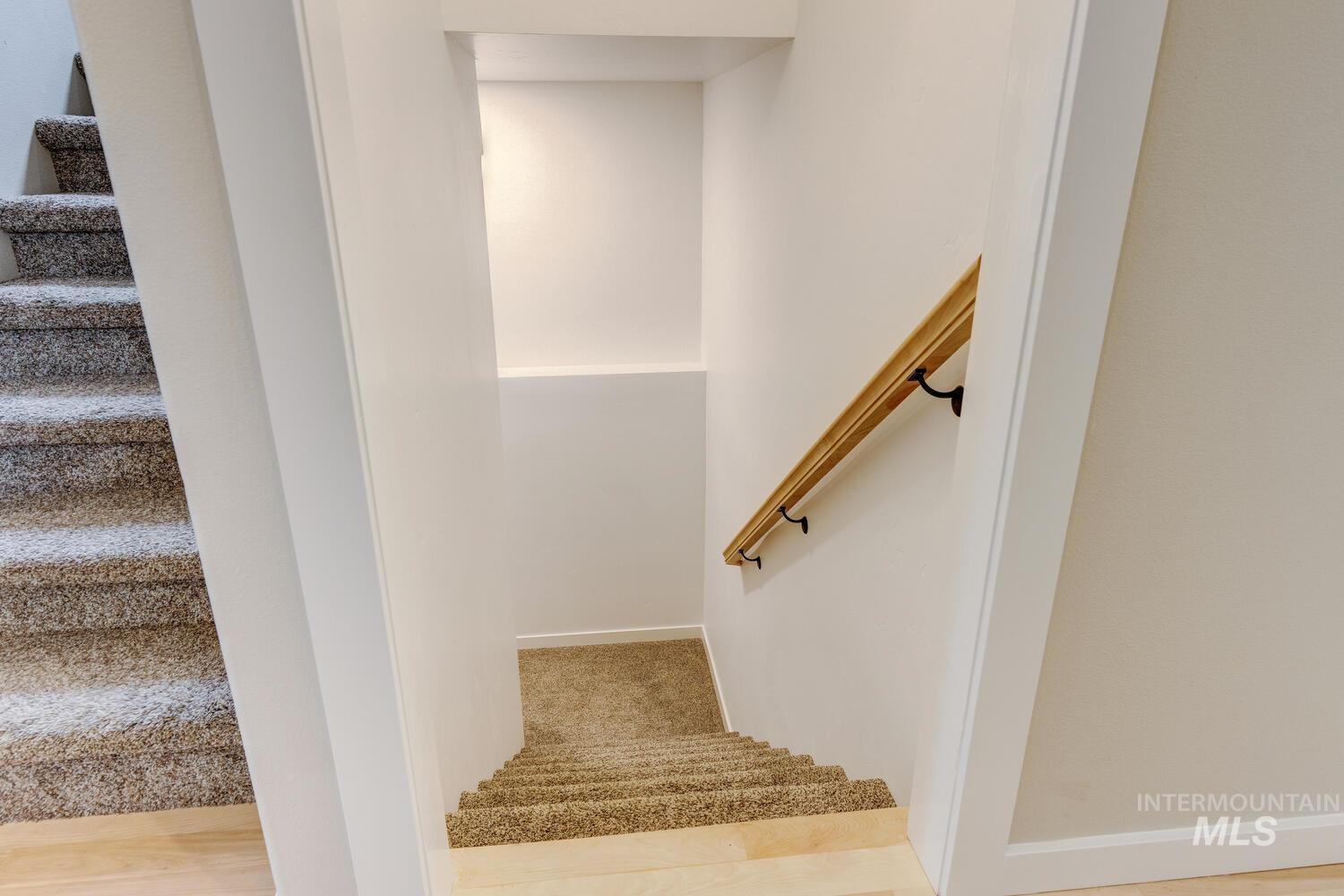 5572 West School Ridge Road Boise, ID 83714 - Photo 27 of 50 Stairs with baseboards