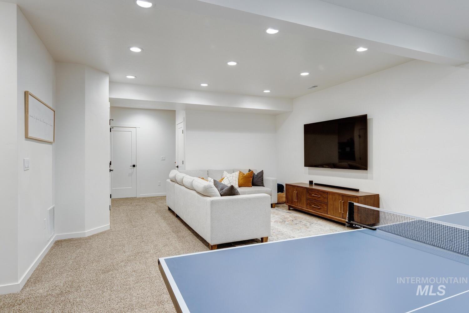 5572 West School Ridge Road Boise, ID 83714 - Photo 29 of 50 Playroom with recessed lighting and light colored carpet