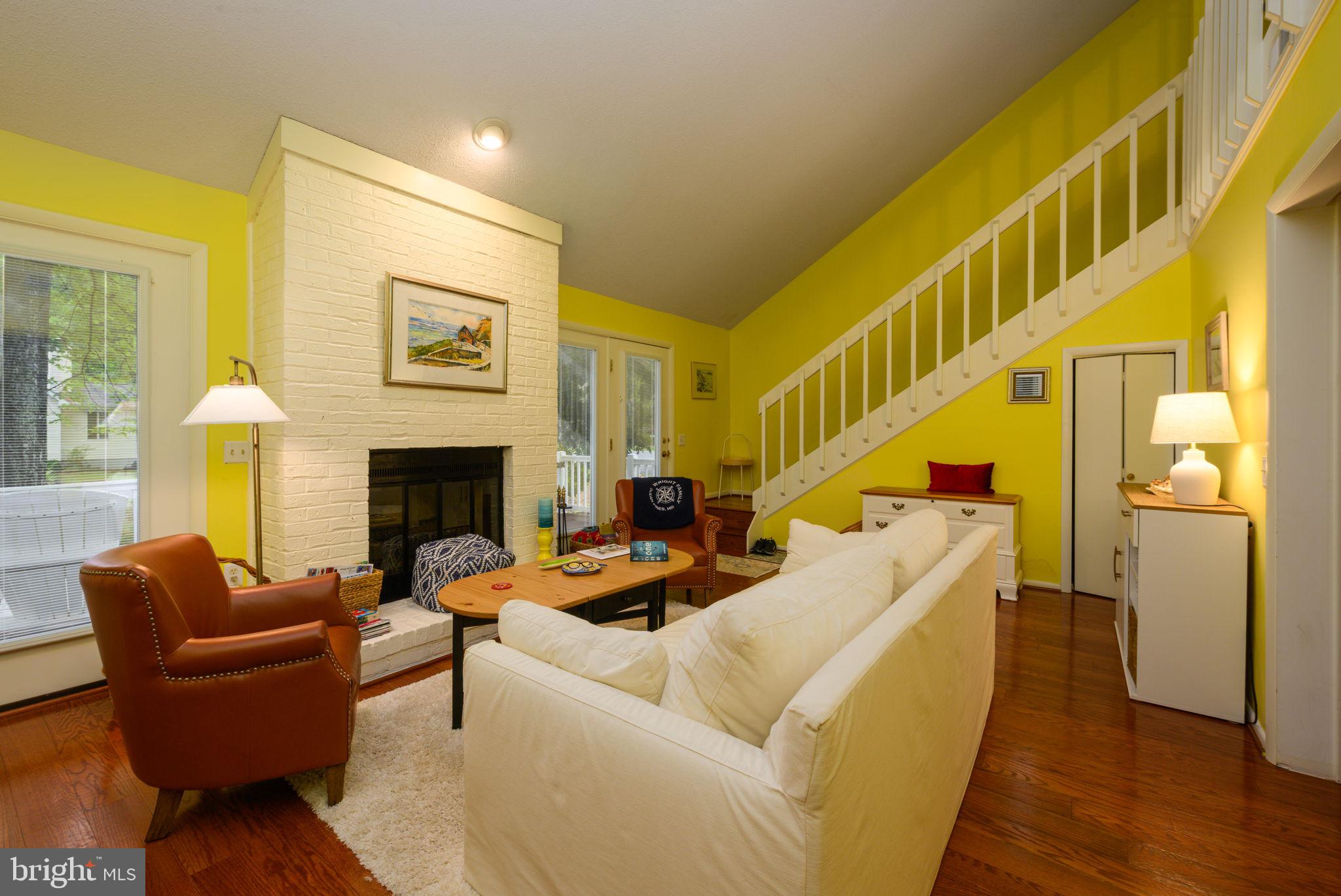 10 Gloucester Road Ocean Pines, MD 21811 - Photo 8 of 37 a living room with furniture and a fireplace