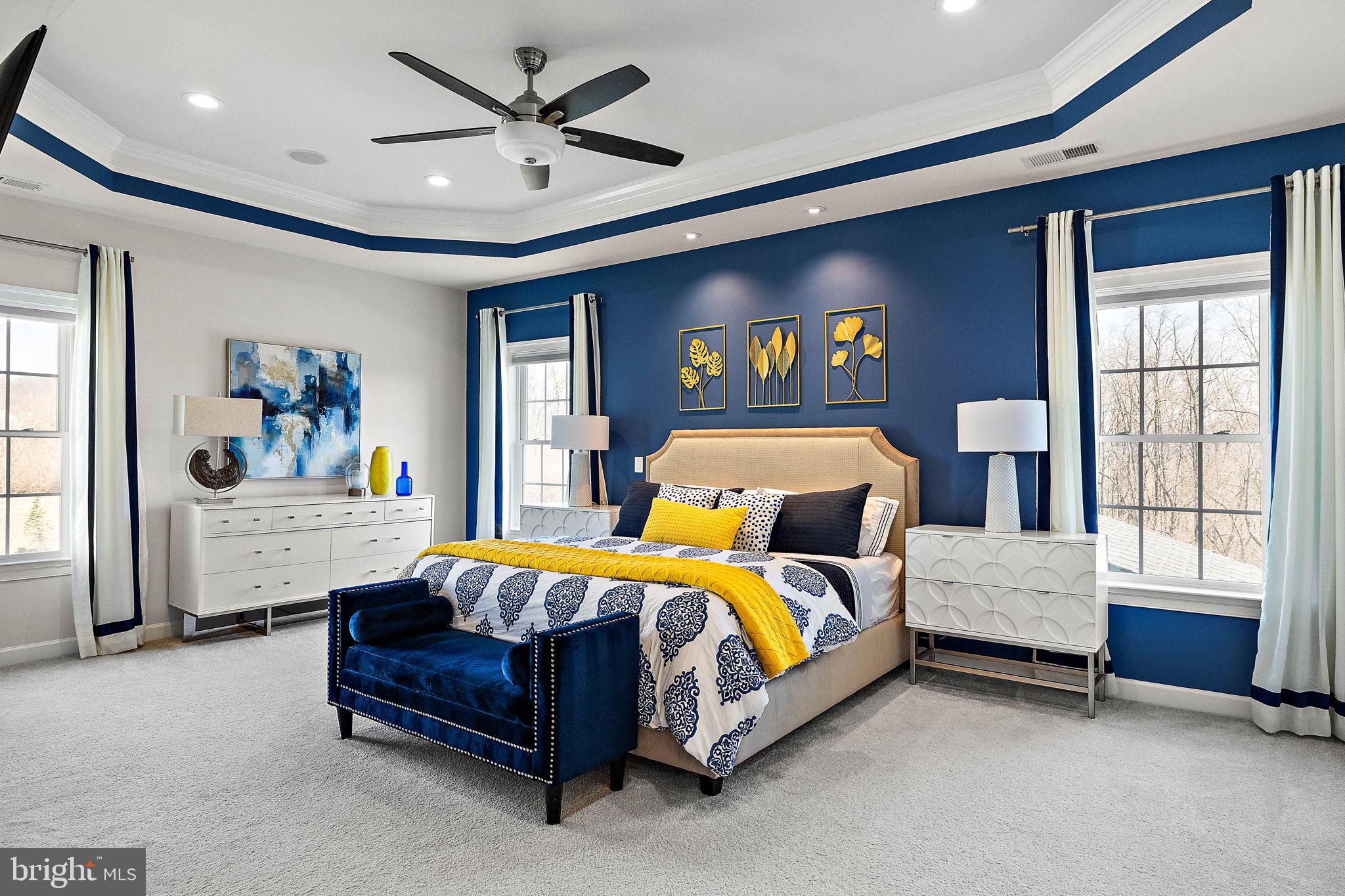 713 Stonecliffe Road Malvern, PA 19355 - Photo 23 of 56 a bedroom with a bed and a chandelier