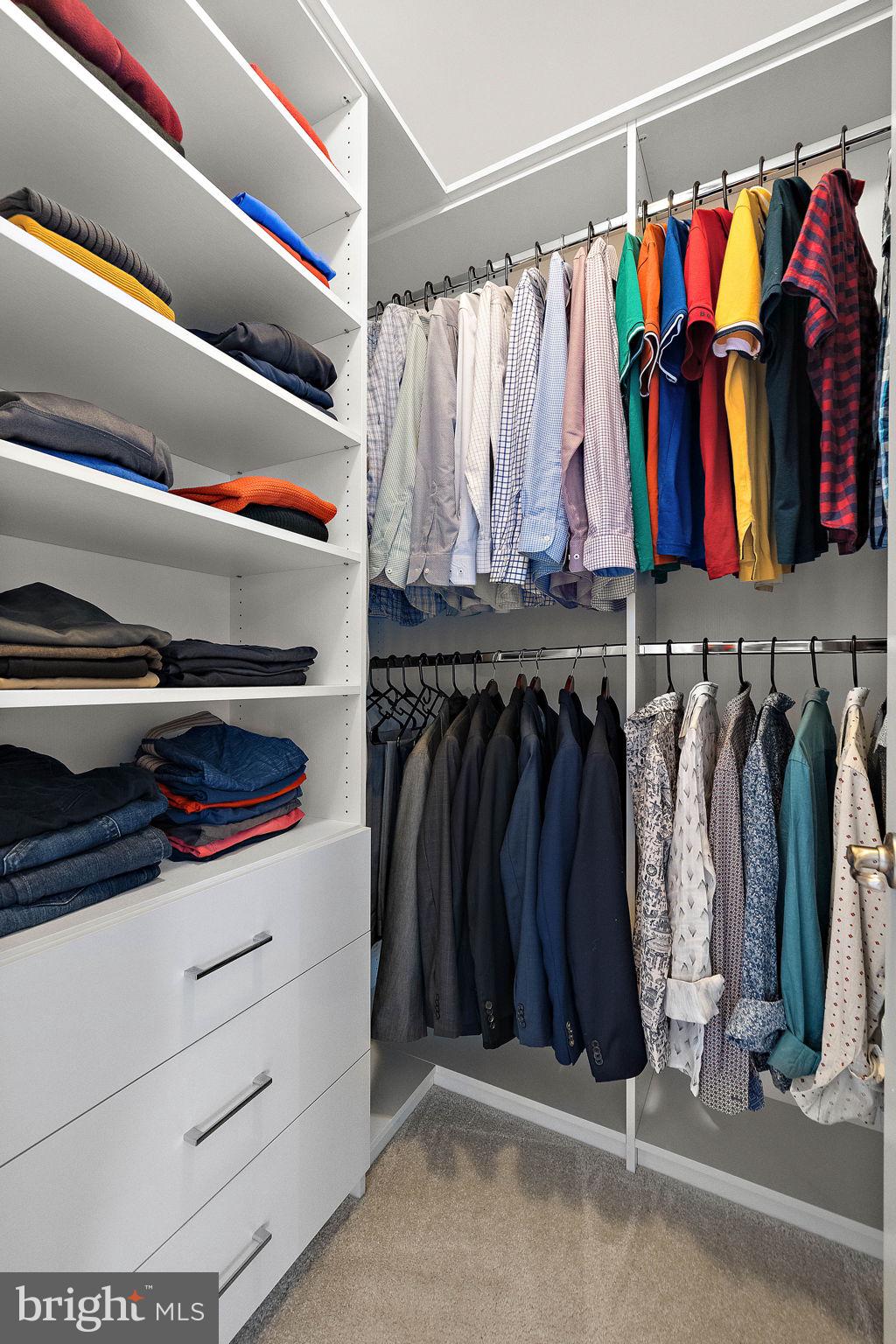 713 Stonecliffe Road Malvern, PA 19355 - Photo 25 of 56 a view of walk in closet with clothes and shoes