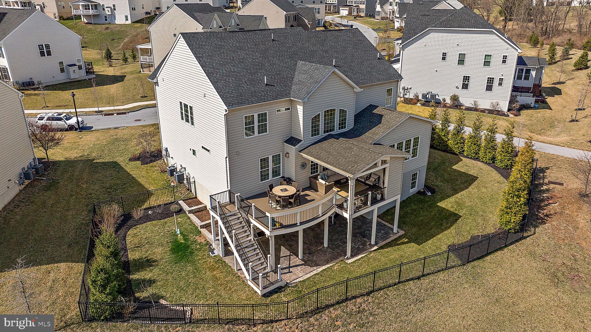713 Stonecliffe Road Malvern, PA 19355 - Photo 53 of 56 an aerial view of a house with swimming pool