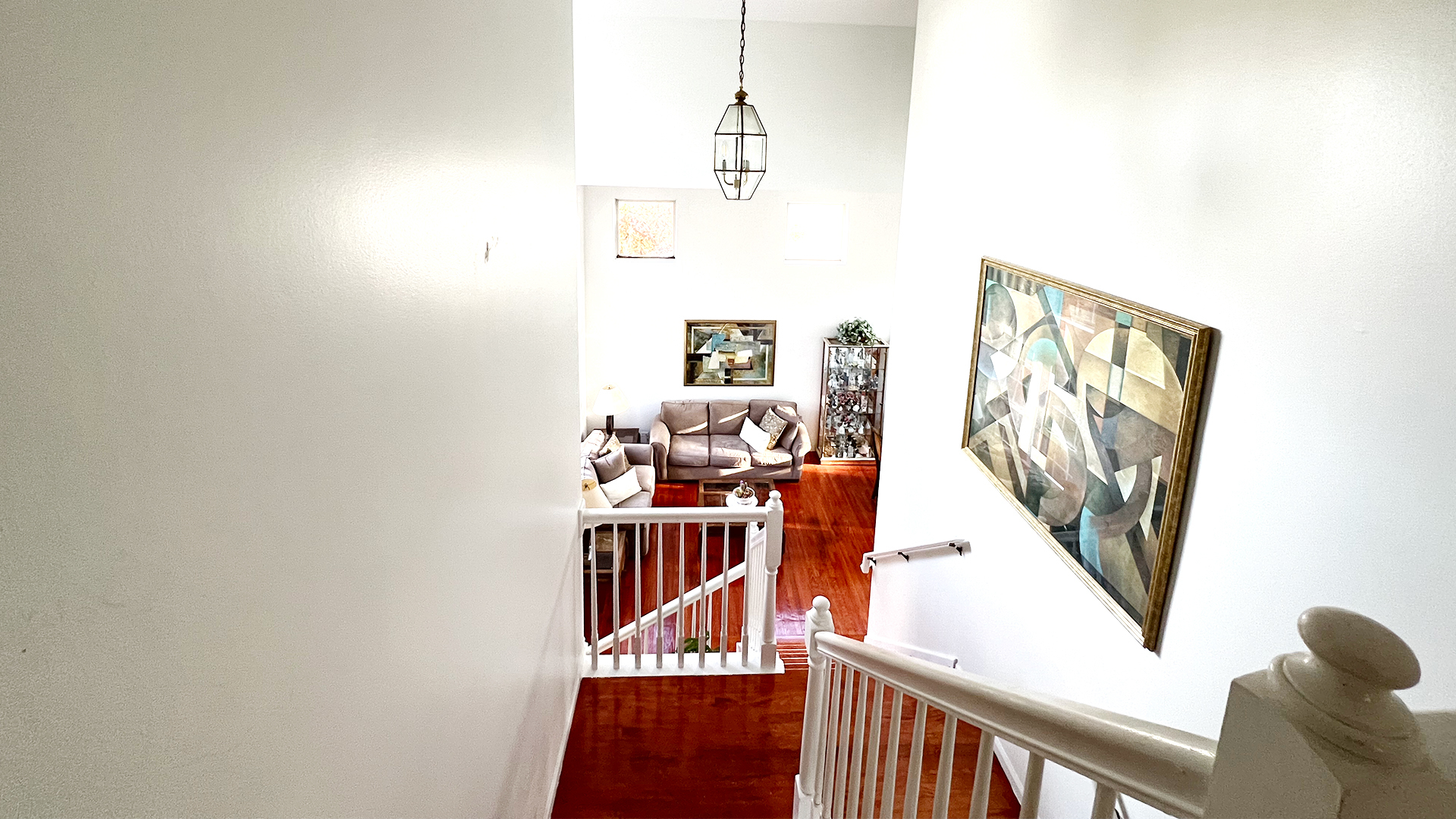 968 Knowles Road Gurnee, IL 60031 - Photo 14 of 33 a view of a hallway with wooden floor and windows