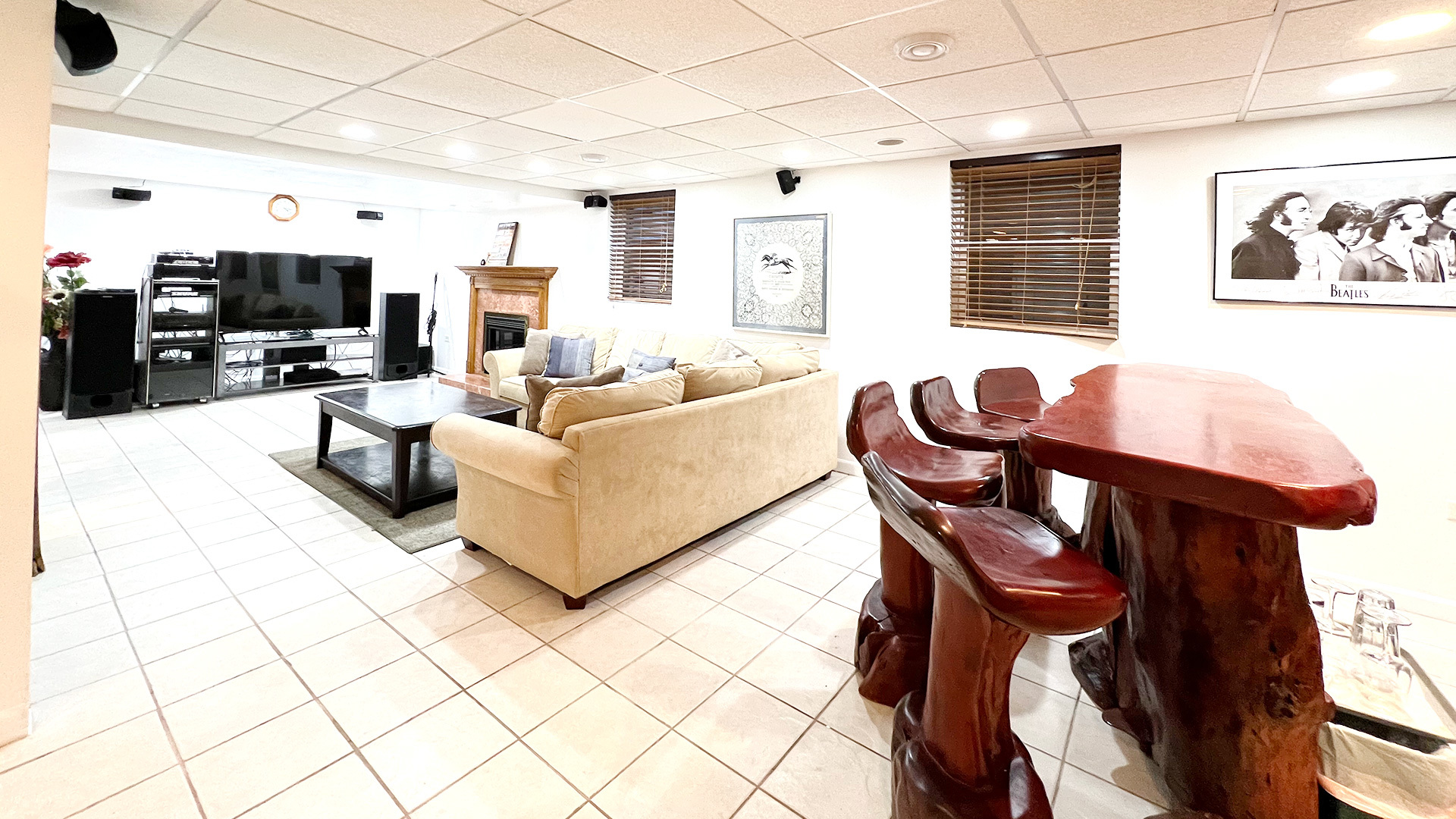 968 Knowles Road Gurnee, IL 60031 - Photo 24 of 33 a living room with furniture a flat screen tv and a window