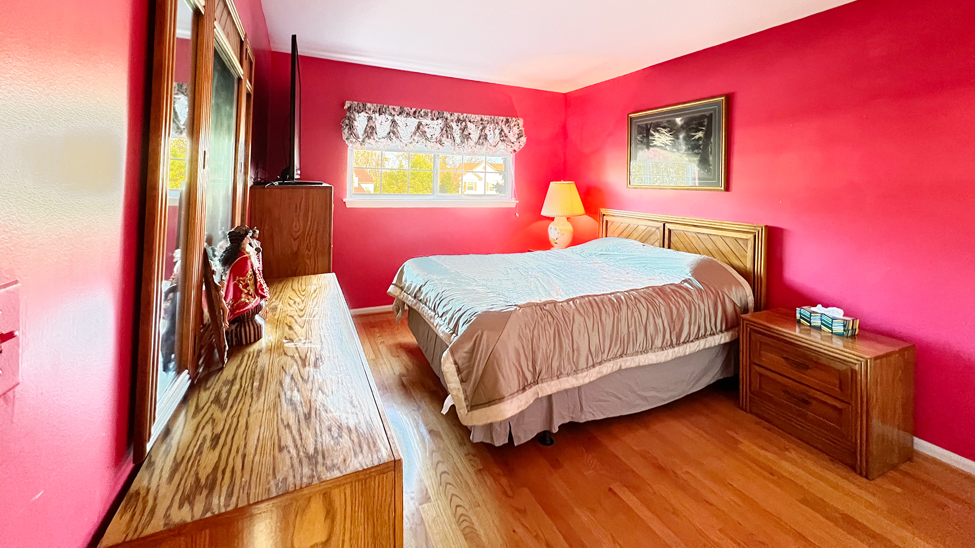 968 Knowles Road Gurnee, IL 60031 - Photo 31 of 33 a bedroom with a bed and a flat screen tv