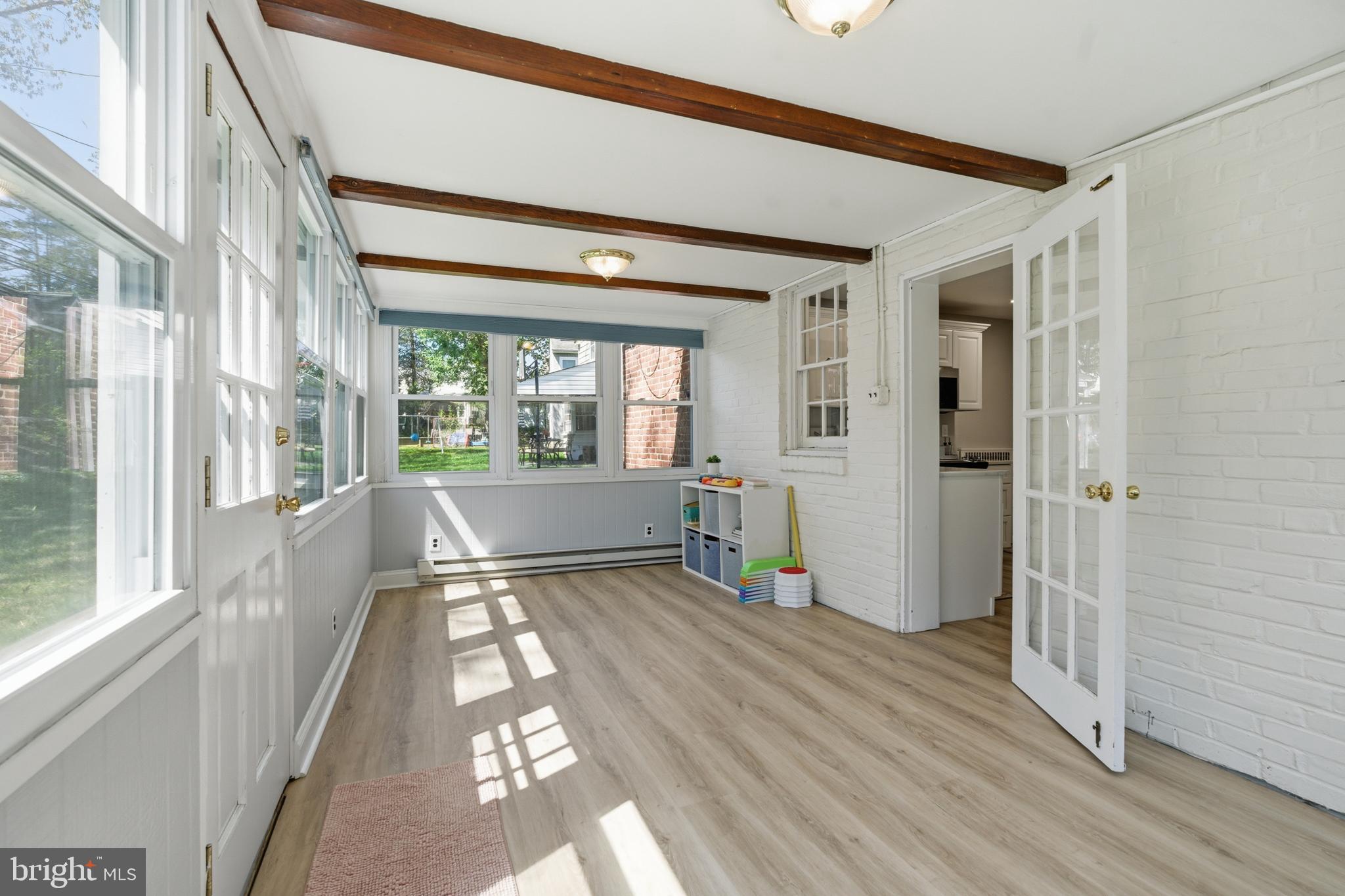 308 Canterbury Road Havertown, PA 19083 - Photo 14 of 26 a view of a room with wooden floor and windows