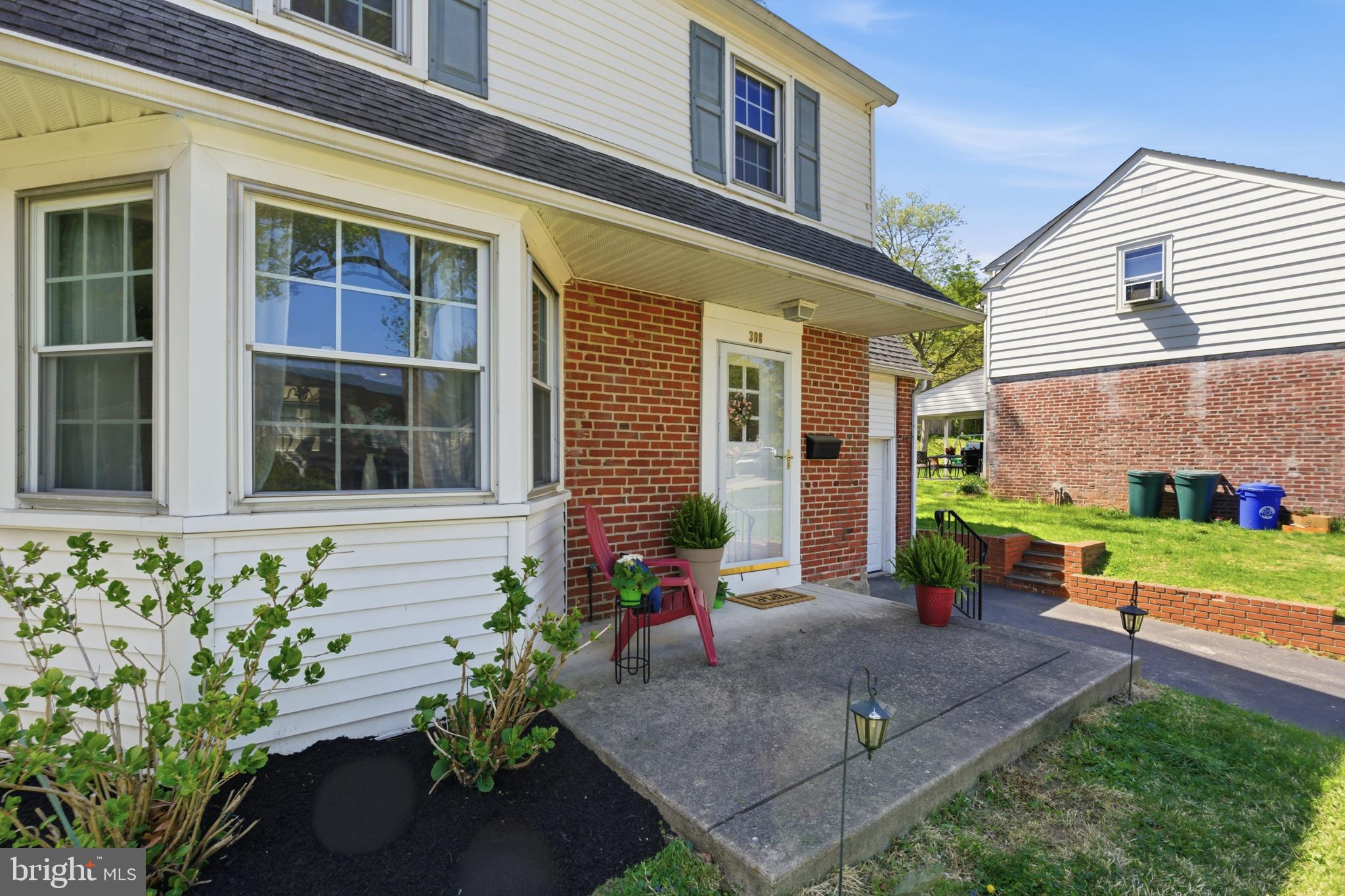 308 Canterbury Road Havertown, PA 19083 - Photo 3 of 26 a front view of a house with a garden and plants