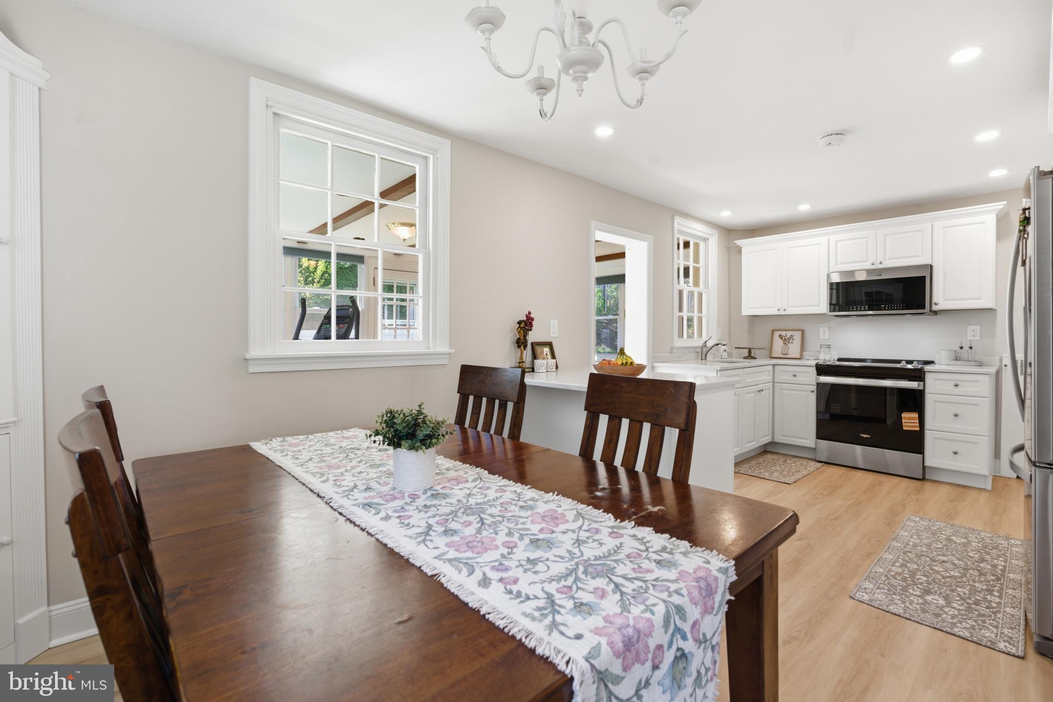 308 Canterbury Road Havertown, PA 19083 - Photo 9 of 26 a view of a a dining room with furniture window and wooden floor
