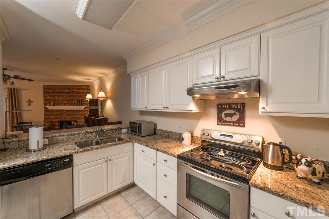 1402 Governors Court Raleigh, NC 27604 - Photo 5 of 15 Kitchen with Bar
