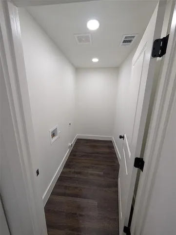 a kitchen with granite countertop a stove and a microwave