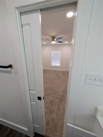a bathroom with a sink and mirror