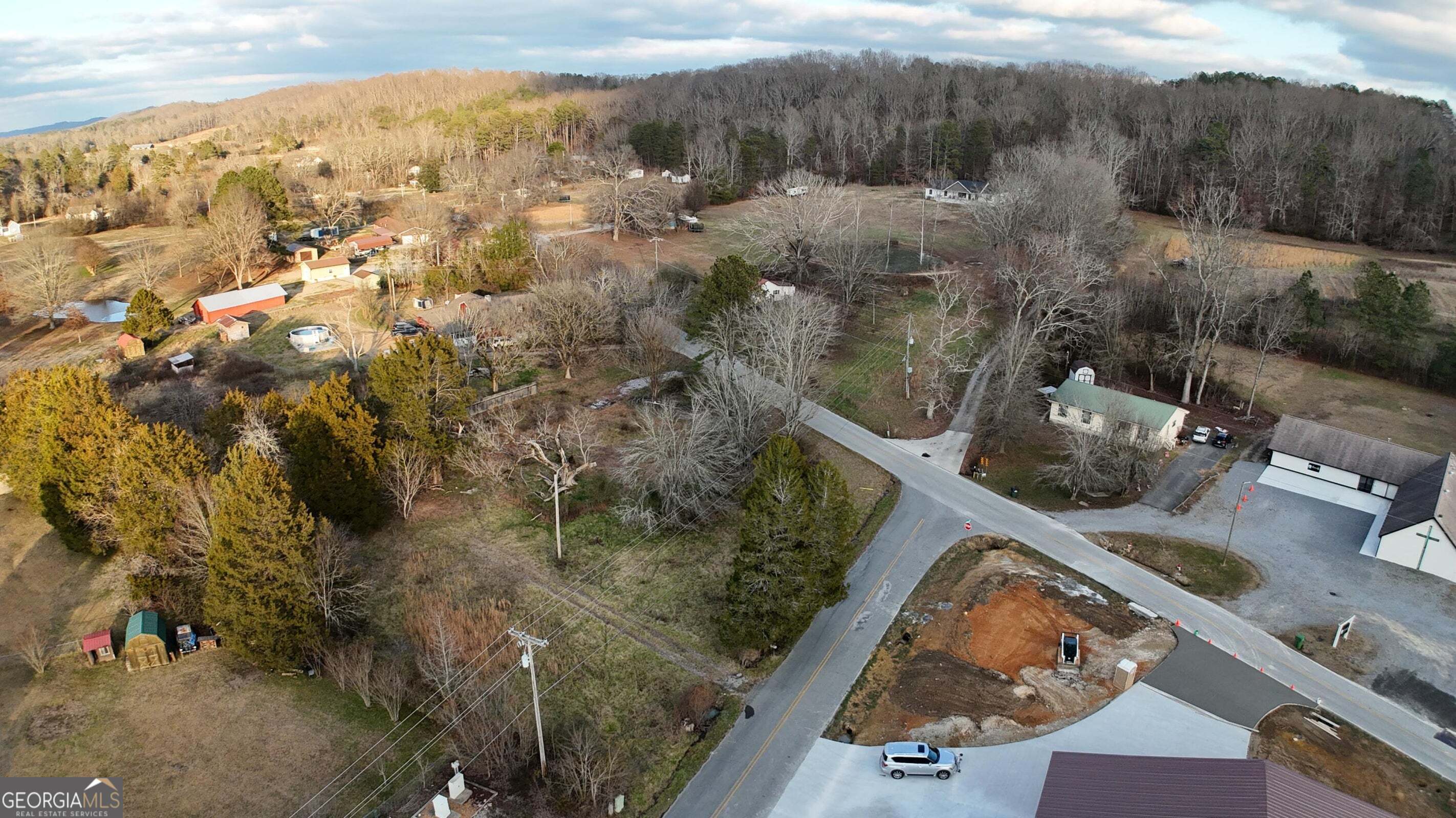 1585 East Reed Road LaFayette, GA 30728 - Photo 4 of 8 an aerial view of a house with a yard
