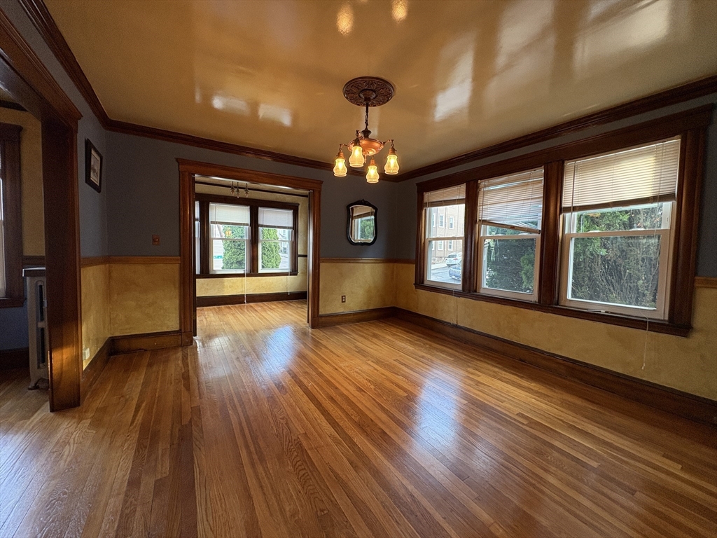 155-157 Hillside Street, Unit 2 Boston, MA 02120 - Photo 2 of 15 a living room with hardwood floor