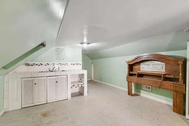 a utility room with cabinets