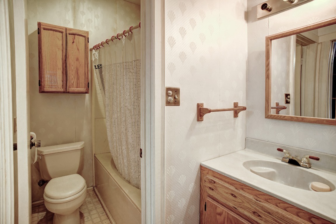 113 My Road Bastrop, TX 78602 - Photo 29 of 35 Bathroom featuring vanity and shower / bath combo with shower curtain