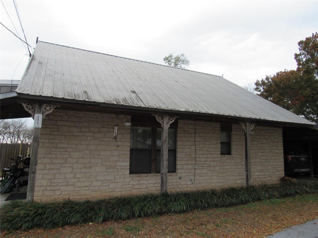 113 My Road Bastrop, TX 78602 - Photo 4 of 35 View of side of 2nd home with a metal roof