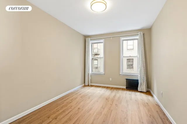 a kitchen that has a sink and a stove