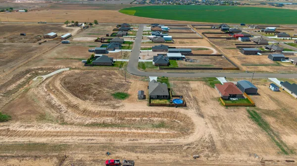 a kitchen with stainless steel appliances kitchen island granite countertop a sink and cabinets
