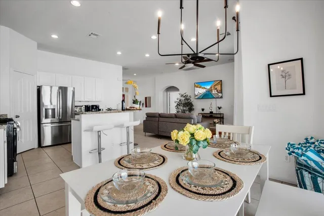 a bedroom with a large bed and a couch