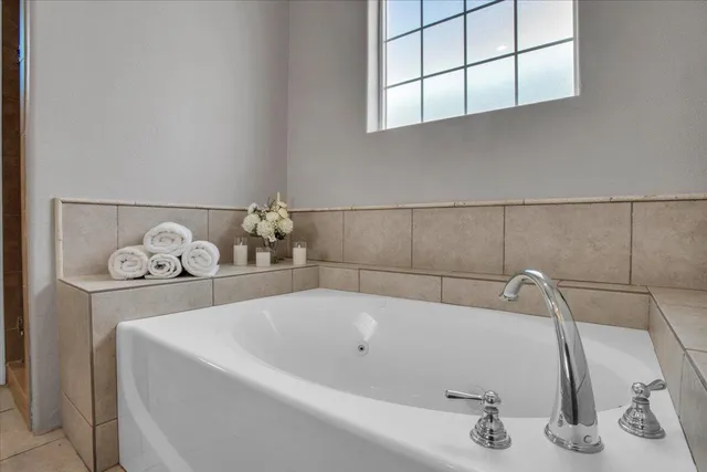 a view of storage and utility room with washer and dryer