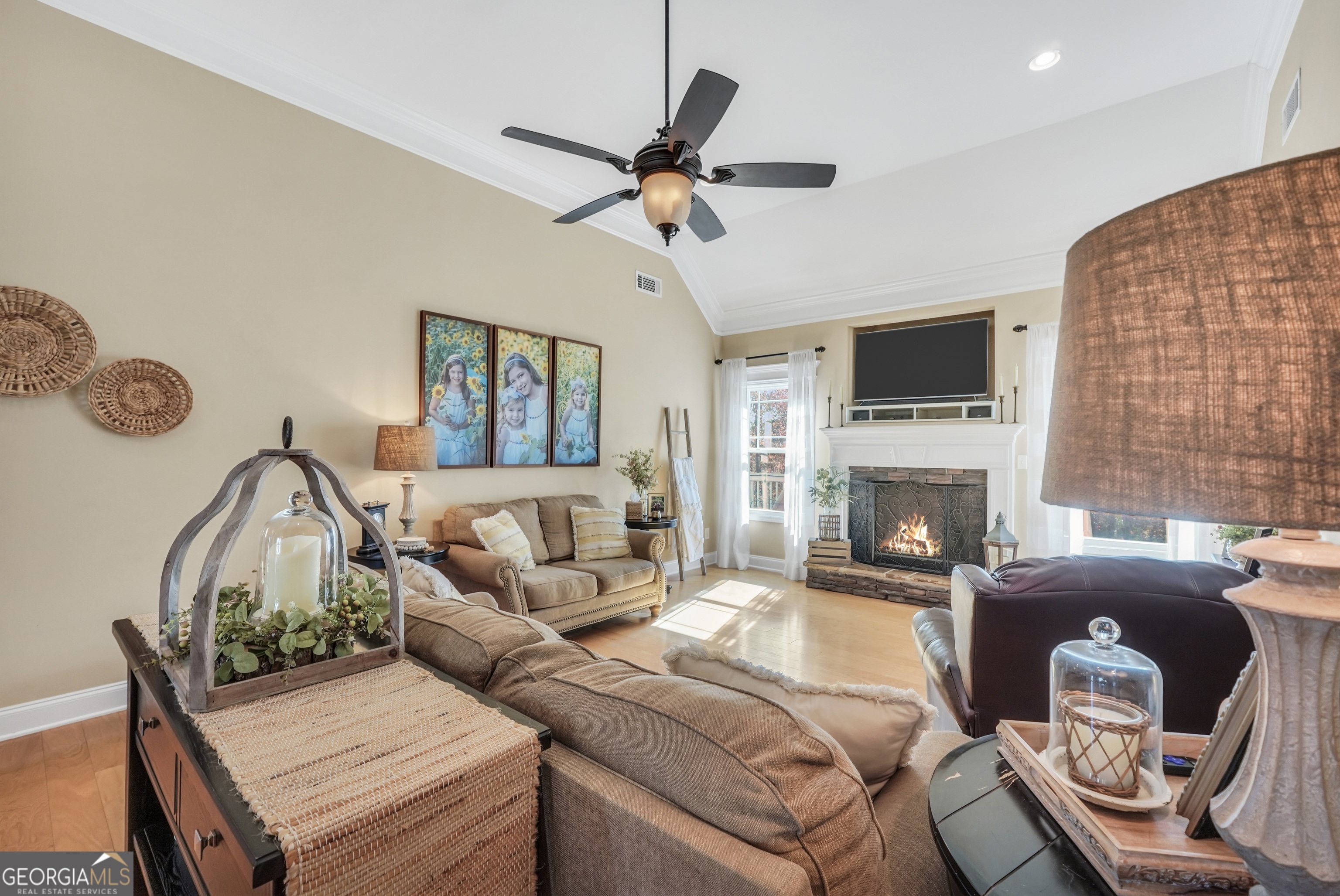 196 Magnolia Trace Milner, GA 30257 - Photo 13 of 48 a living room with furniture and a fireplace