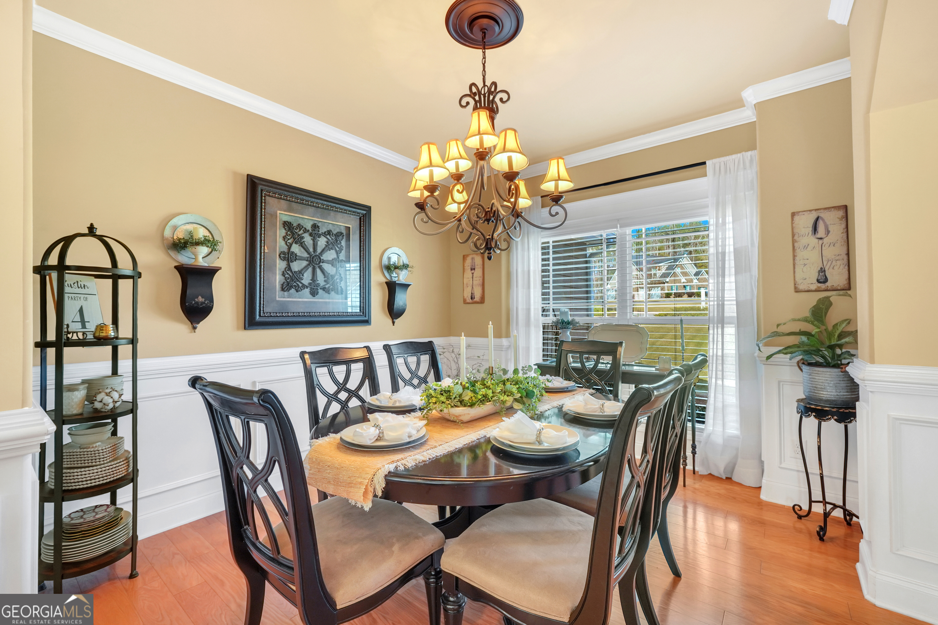 196 Magnolia Trace Milner, GA 30257 - Photo 15 of 48 a view of a dining room with furniture window and wooden floor