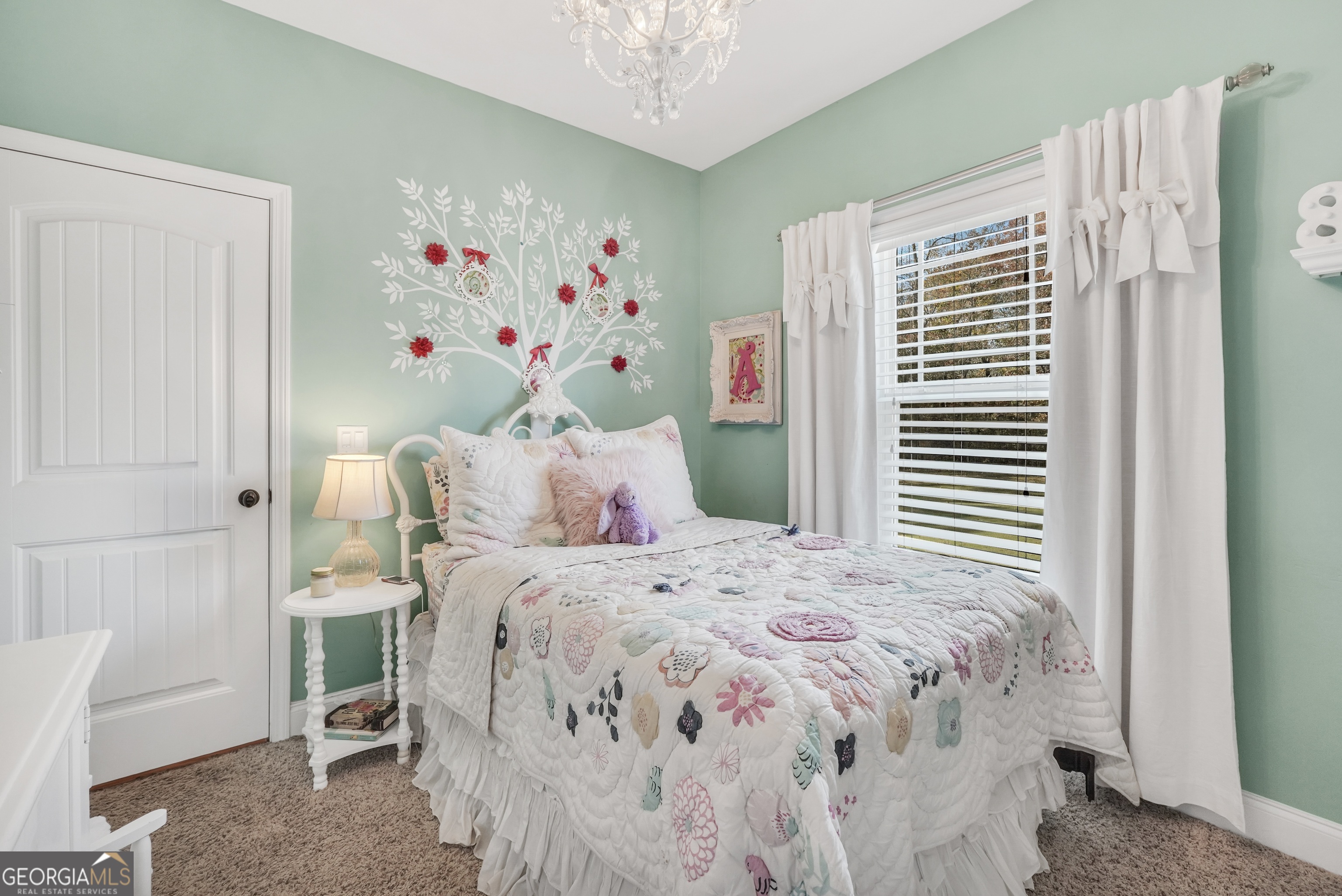 196 Magnolia Trace Milner, GA 30257 - Photo 33 of 48 a bedroom with a bed and a window