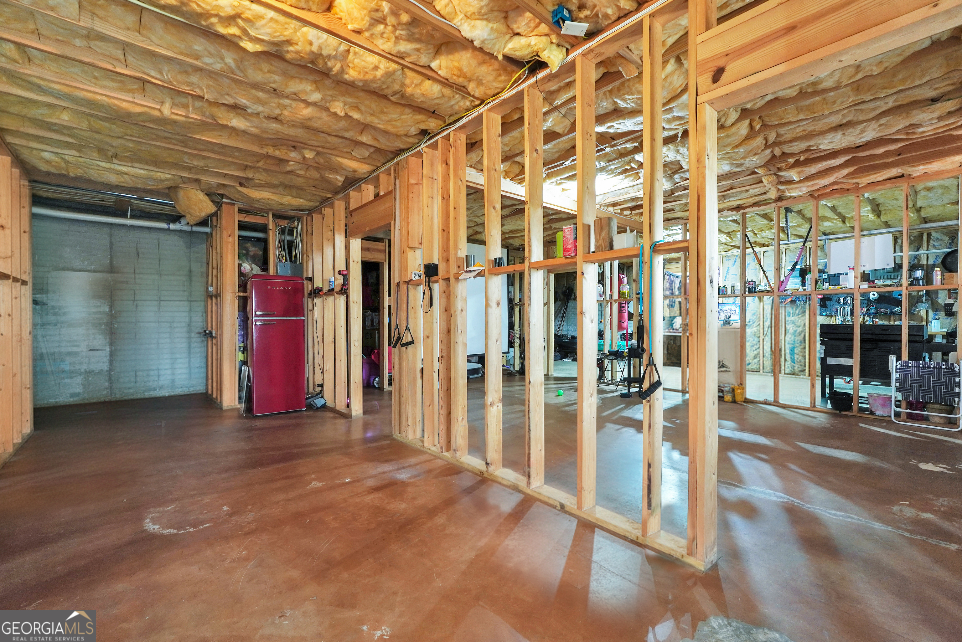 196 Magnolia Trace Milner, GA 30257 - Photo 45 of 48 a view of a room with wooden walls
