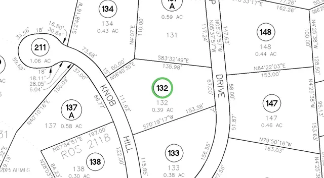 a view of a lake from a yard