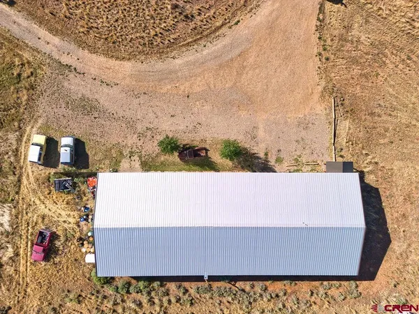 a view of a garage with a building