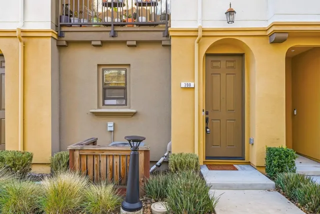 a bedroom with a bed and a table