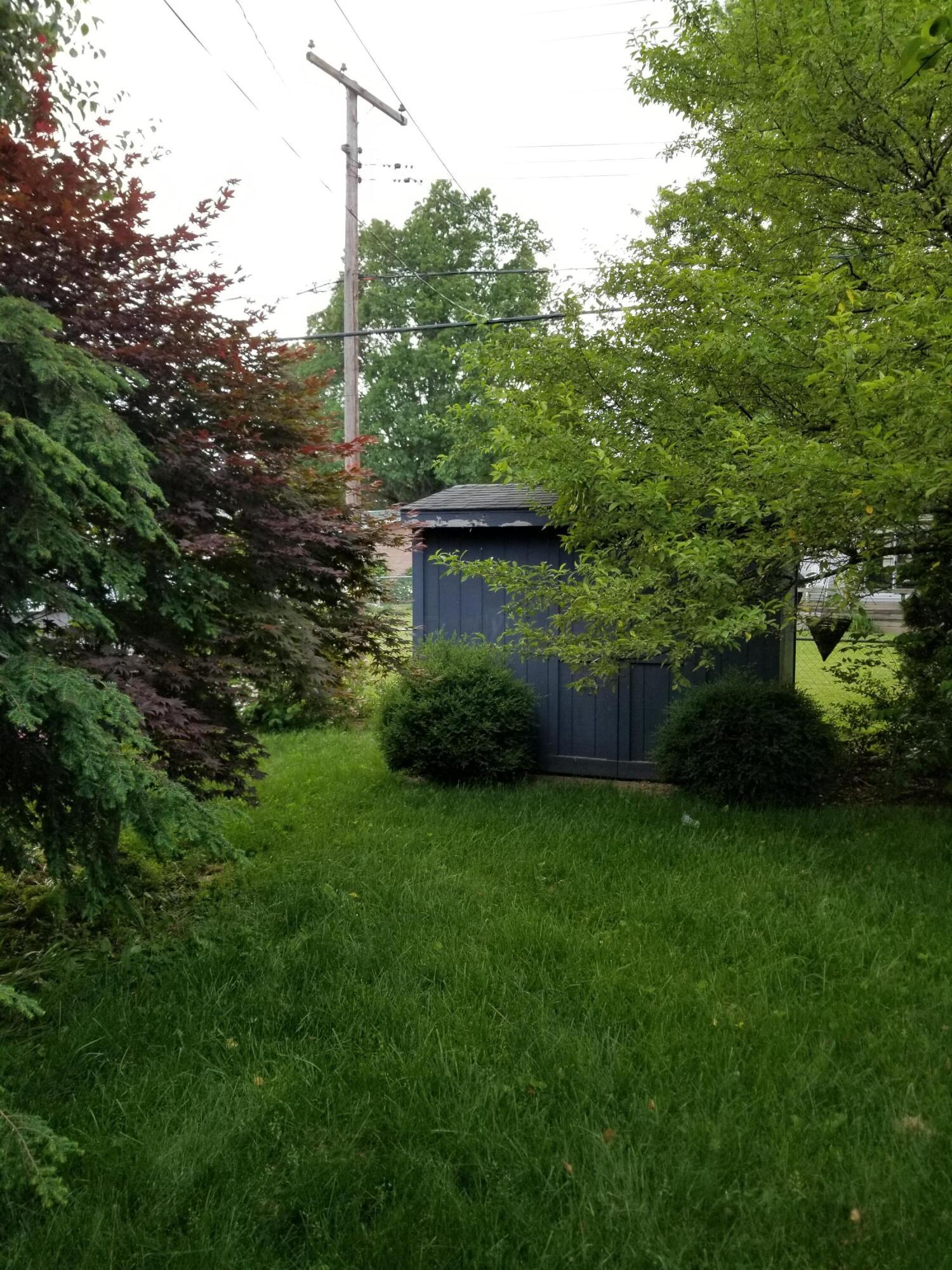 460 Jefferson Road Newark, OH 43055 - Photo 19 of 21 Do some trimming of trees and bushes and bring back the beauty of this backyard.