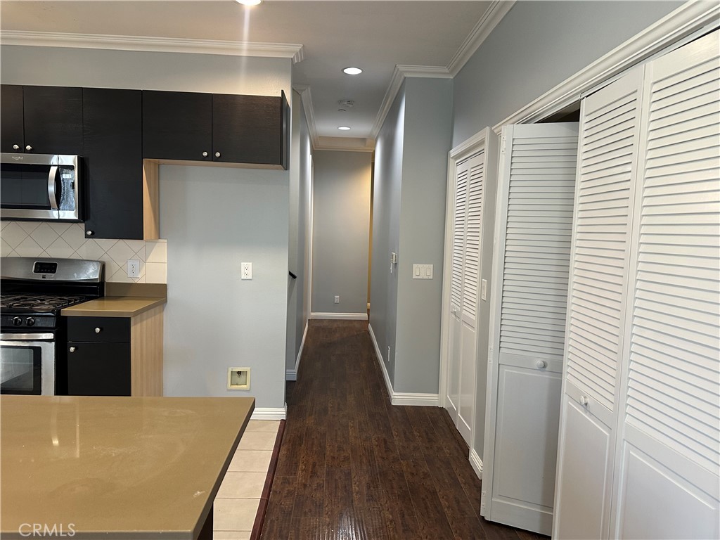 14343 Tiara Street, Unit 2 Sherman Oaks, CA 91401 - Photo 14 of 23 a view of a kitchen from the hallway