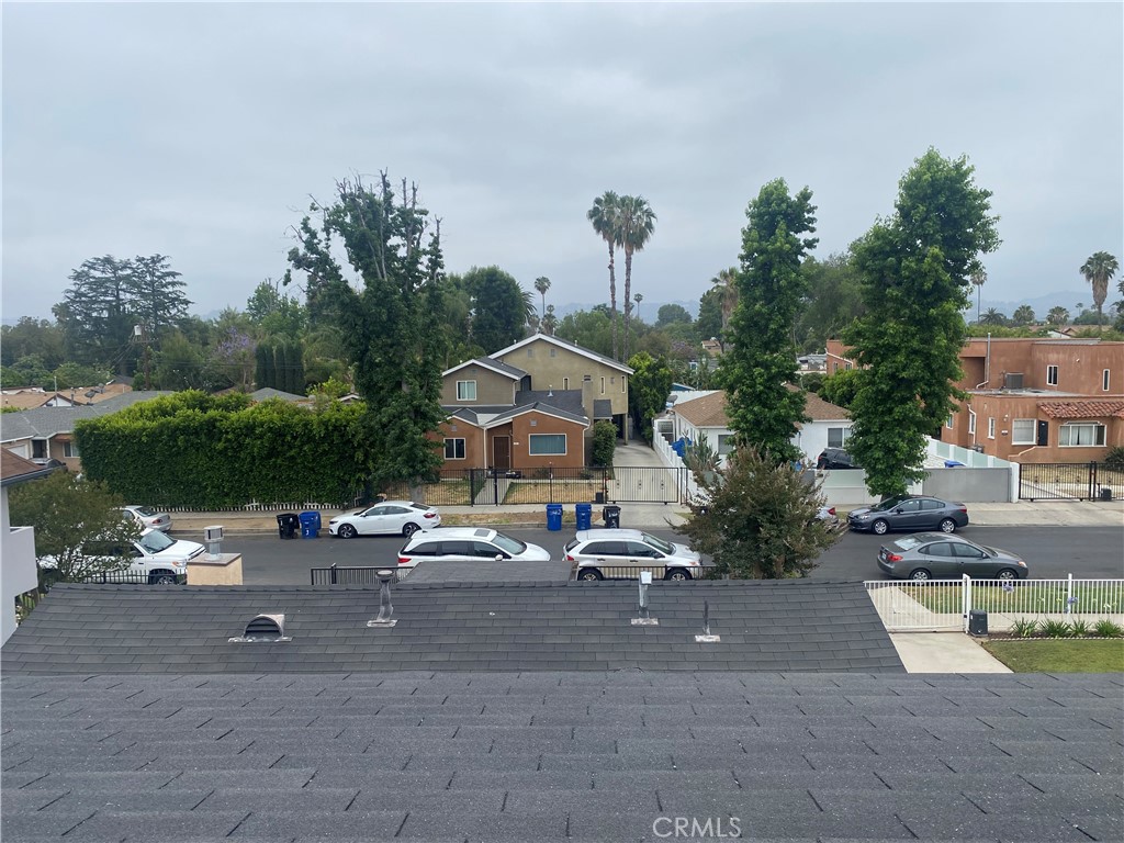 14343 Tiara Street, Unit 2 Sherman Oaks, CA 91401 - Photo 2 of 23 a lots of cars parked in front of a house