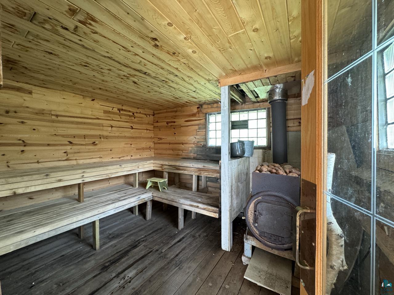 3739 Sundling Road Tower, MN 55790 - Photo 14 of 15 View of sauna / steam room featuring wood walls, hardwood / wood-style flooring, and wood ceiling