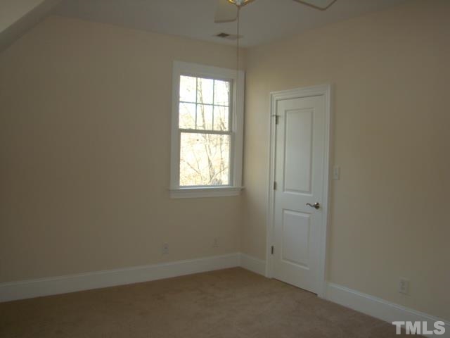 3517 Blue Ridge Road Raleigh, NC 27612 - Photo 11 of 16 an empty room with windows