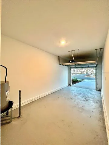 an empty room with a empty space and windows